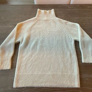 Cream Turtleneck Sweater with Cozy Knit and Relaxed Fit